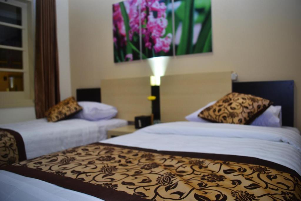 Srikandi Guesthouse มะลัง ภายนอก รูปภาพ
